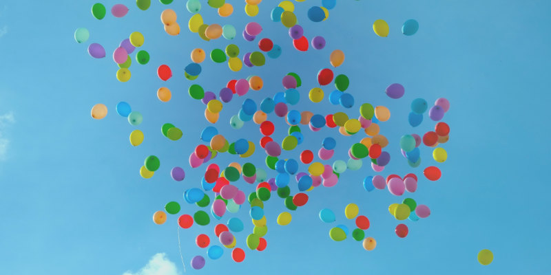 Balloons floating away