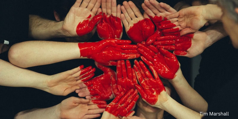 heart painted on hands